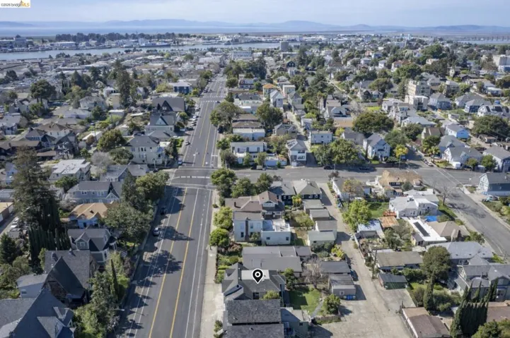 Aerial view of residential area featuring mountains