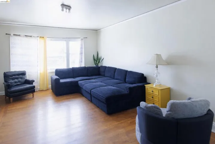 Living area with wood finished floors