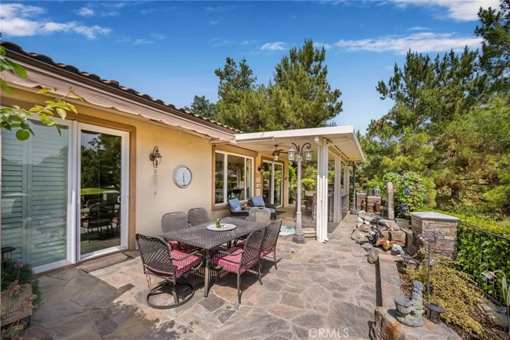 Backyard Paradise with Patio Cover and Extendable Awning