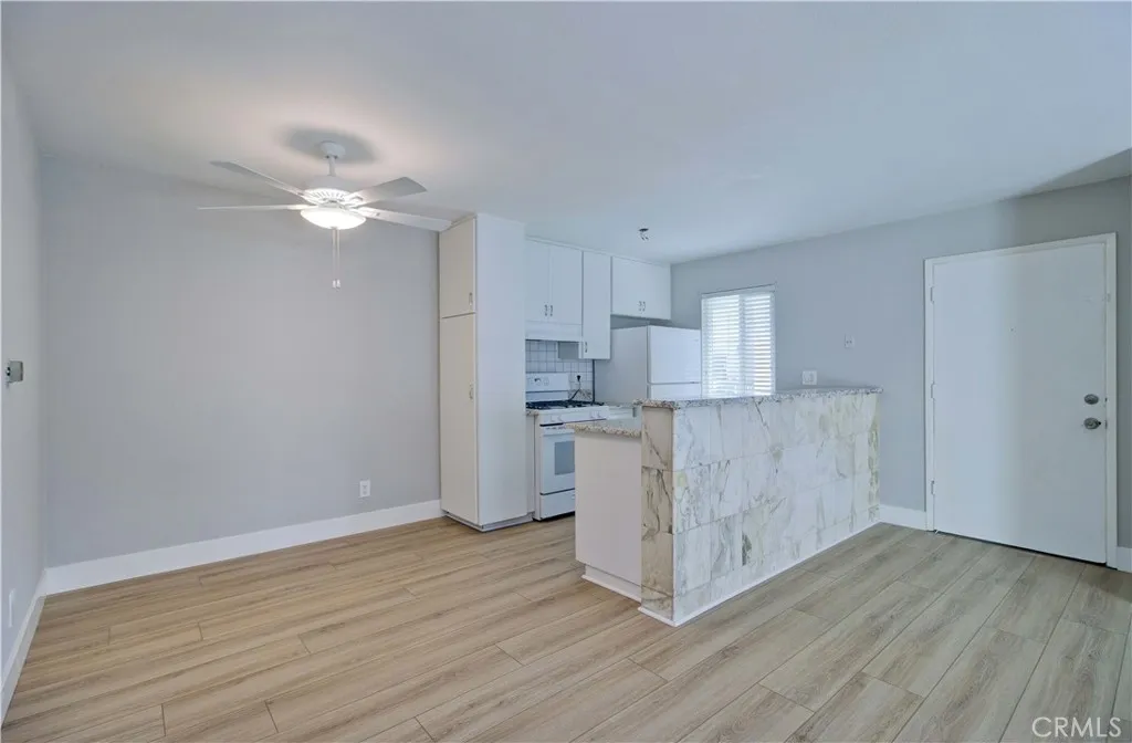 Kitchen nook and kitchen.
