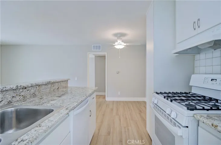 Kitchen looking towards nook and bedroom.