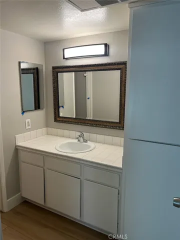 Bathroom vanity with new light and mirror