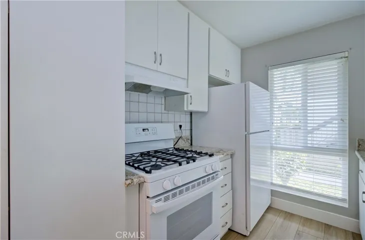 Kitchen stove and refrigerator