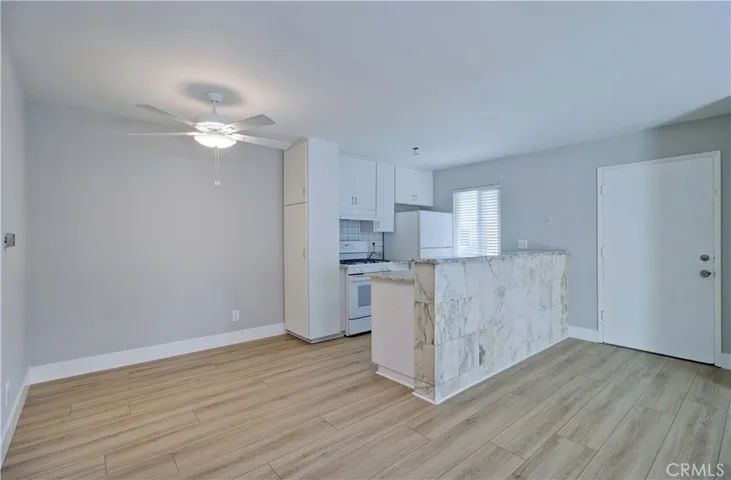 Kitchen nook and kitchen.