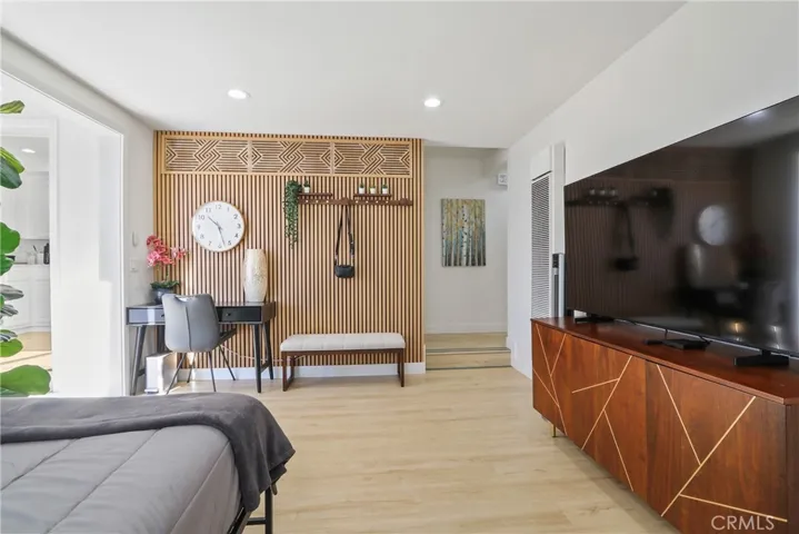 Furnished Living Room with Day Bed, Desk, TV