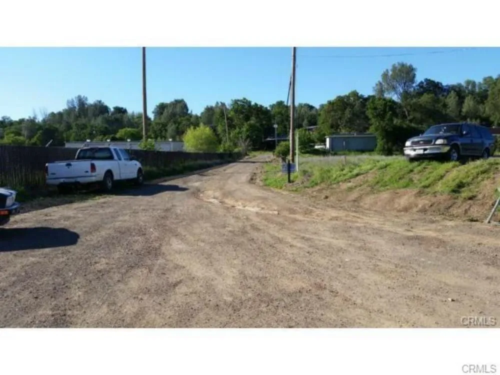 Dirt road leading to lot area. Gate is not locked.