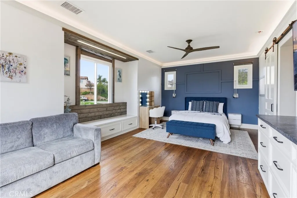 2nd primary bedroom with built in coffee bar and large seating area