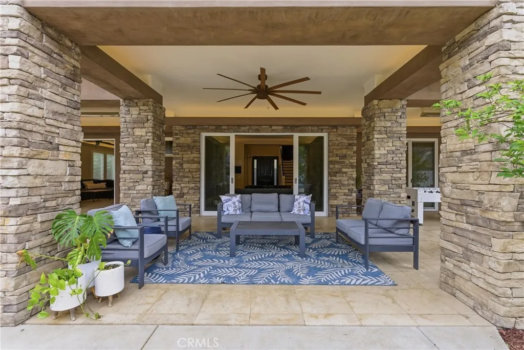 Covered patio seating area with indoor outdoor living space