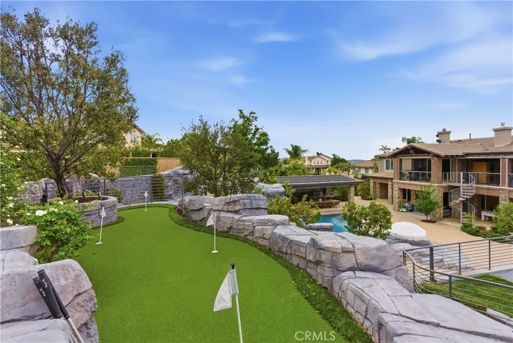 Private putting green with hillside views