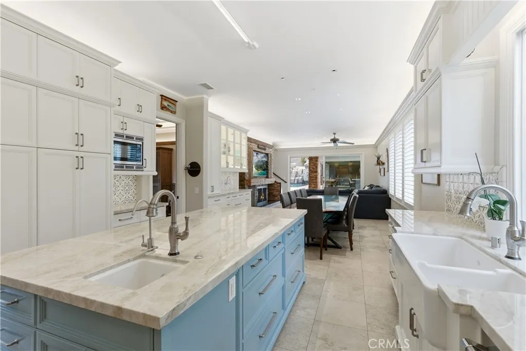 View of open concept kitchen to dining and family room