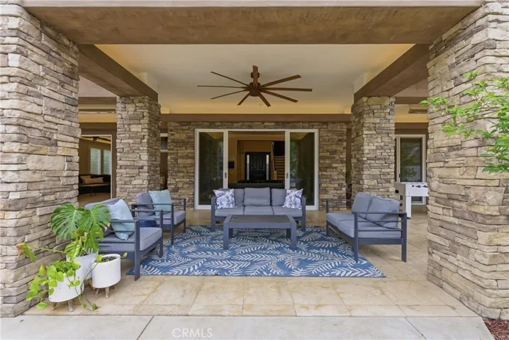 Covered patio seating area with indoor outdoor living space