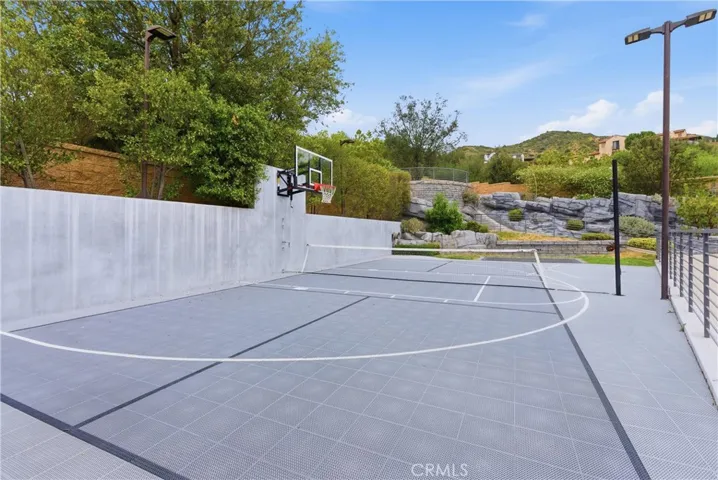 Private sports court with basketball and pickleball