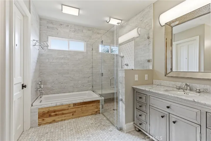 Large bathroom with soaker tub, and walk in shower