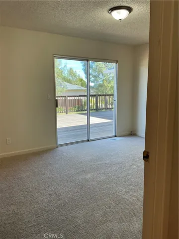 Primary bedroom slider to the deck