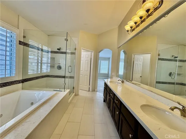 Remodeled Primary bathroom includes Quartz Countertops