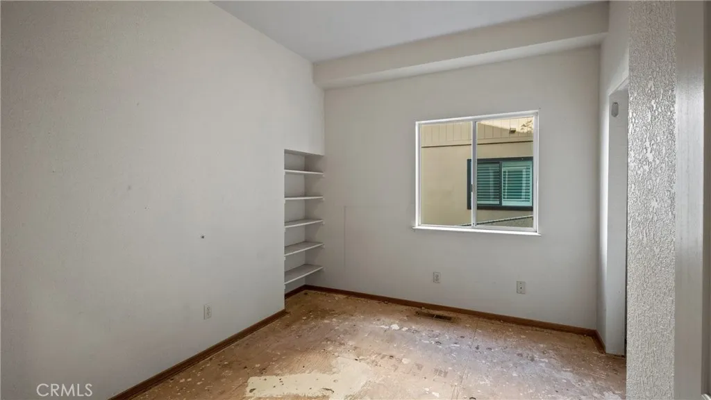 1 of 2 rooms with closets downstairs.
