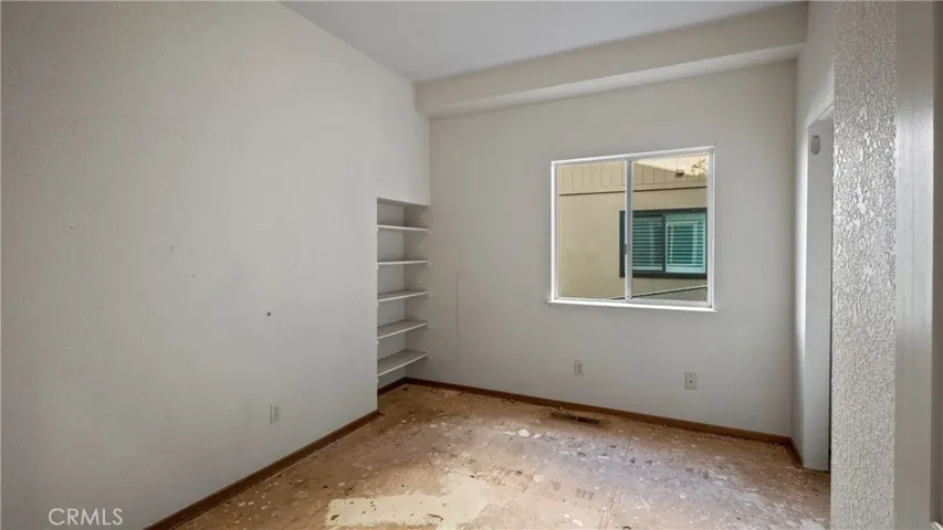 1 of 2 rooms with closets downstairs.