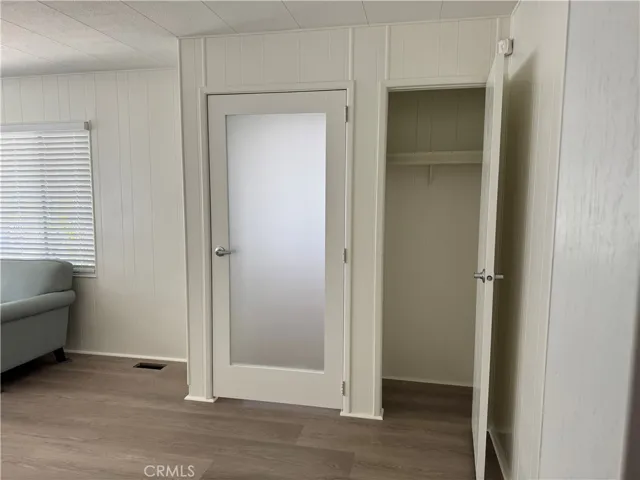 Entry Door from Sunroom to Living room and entry closet