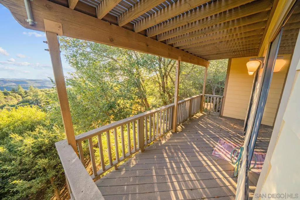 private deck off of primary bedroom.