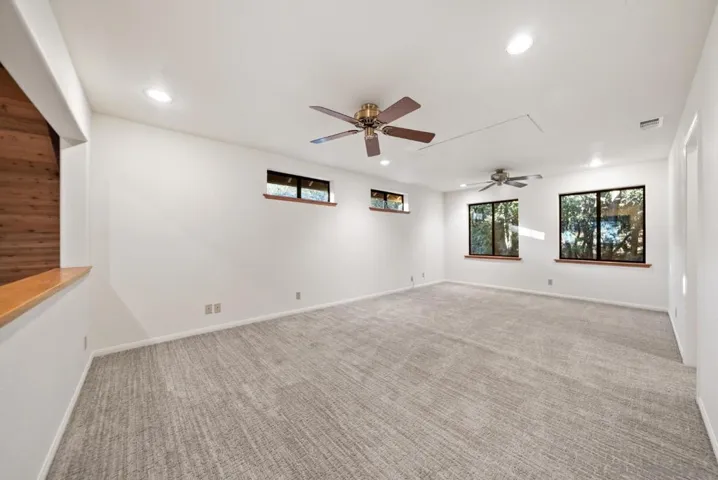 Large loft upstairs can serve as a 4th bedroom, office, or rec room