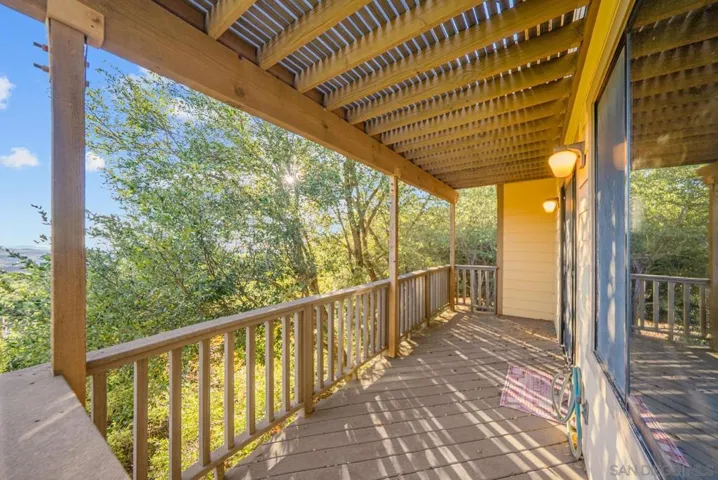 private deck off of primary bedroom.