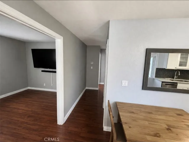 hallway/ living room area Virtually staged photos.