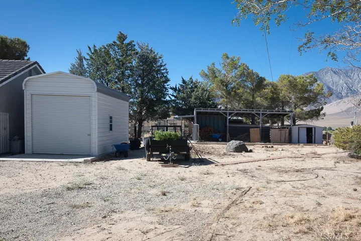 Metal RV Garage and Chicken coop.