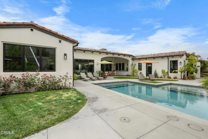 Pool and house
