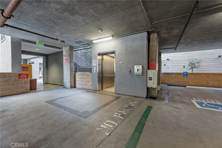 Look for the elevator on the ground floor after you park. Lock box is on wire to the right side of the elevator.