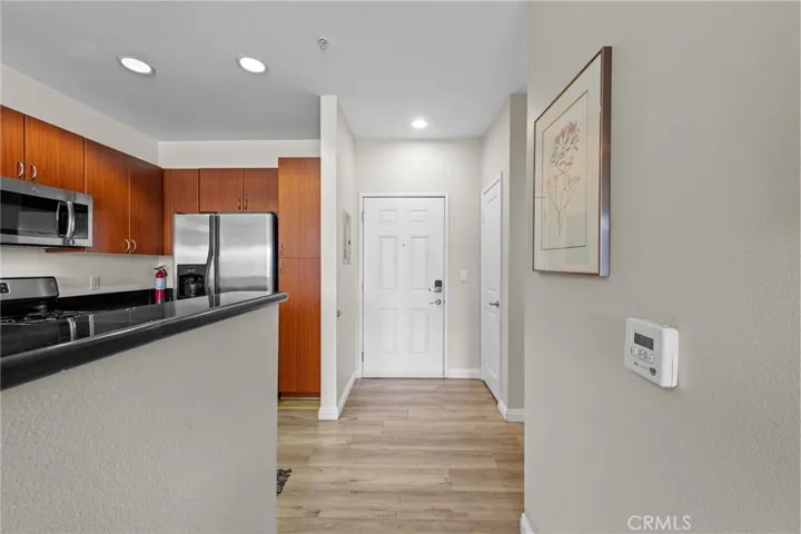 Looking back to the entry. Coat closet to the right.