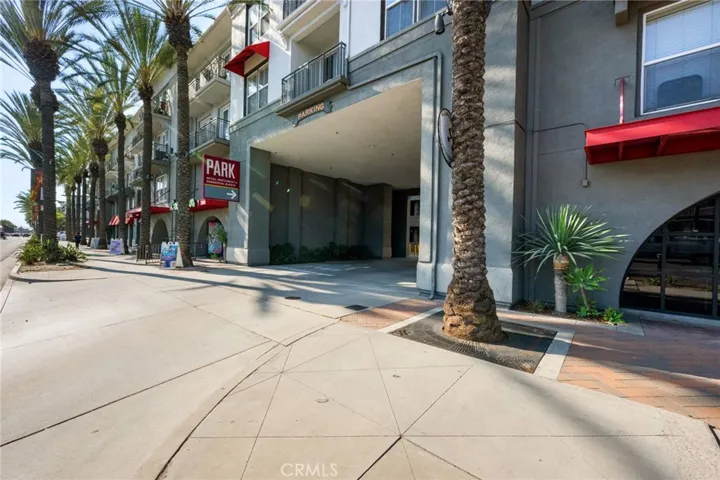 Pull in here to park at guest parking. Look for the elevator to access unit.