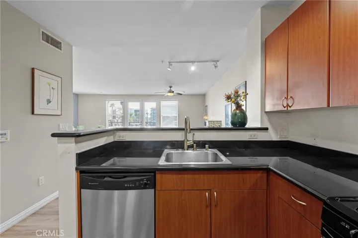 The kitchen opens to the Living areas.