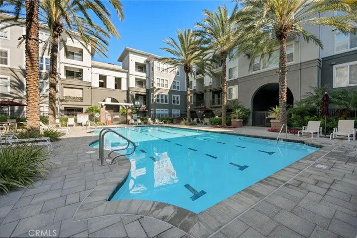 Pool area with lounge chairs.