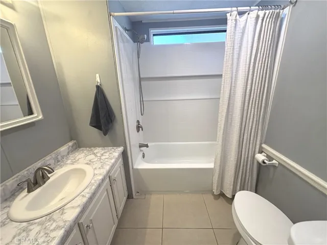 Updated bathroom with shower and tub.