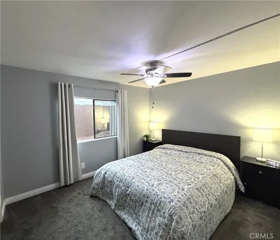 Main Bedroom with ceiling fan.