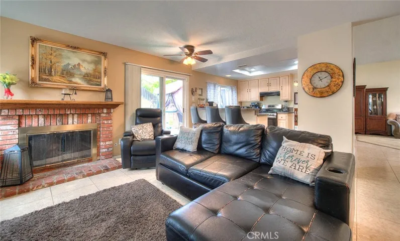 Family room facing kitchen and entry to family room