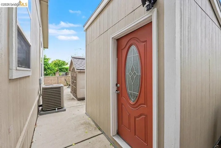Property entrance featuring a patio