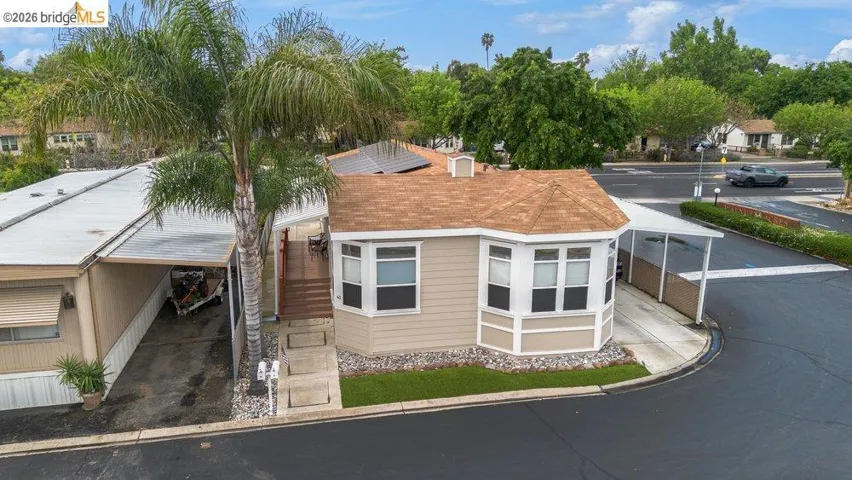 View of front of home with solar panels