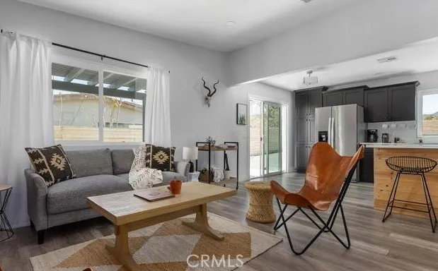 Living to Dining to Kitchen with Patio Exit
