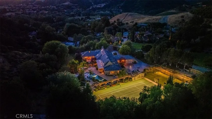 Night Shot with house and sports court lit up