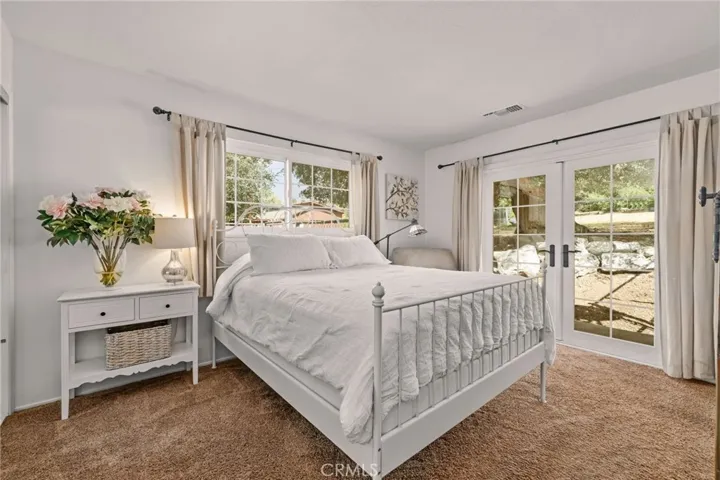 Primary Bedroom with french doors