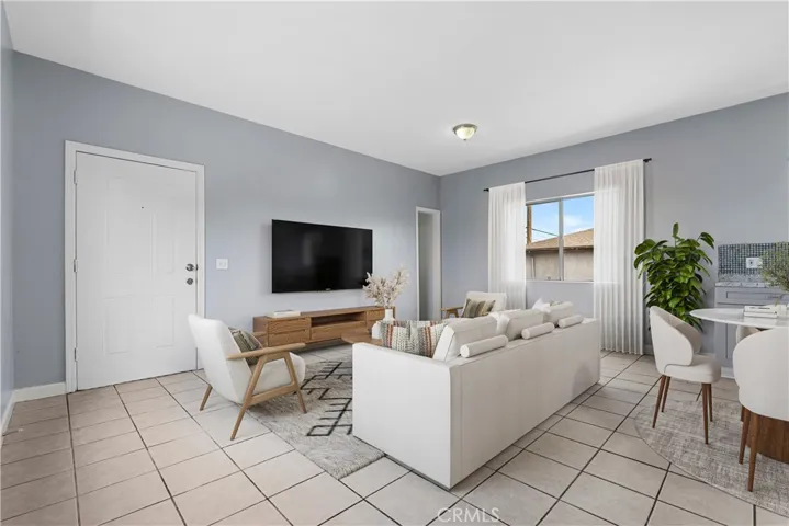 Living Room Area Upper Unit - Virtually Staged and Enhanced.