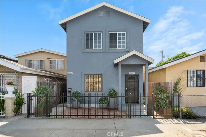 Front Exterior – Virtually Staged; landscaping shown is digital enhancement only.