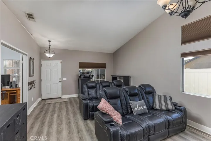Front entrance and living room.  Currently used as media room.