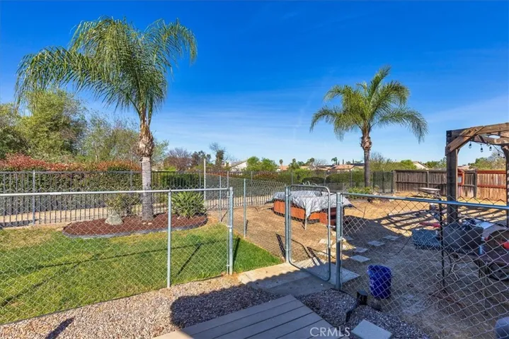 Back yard.  Spa can stay or go.