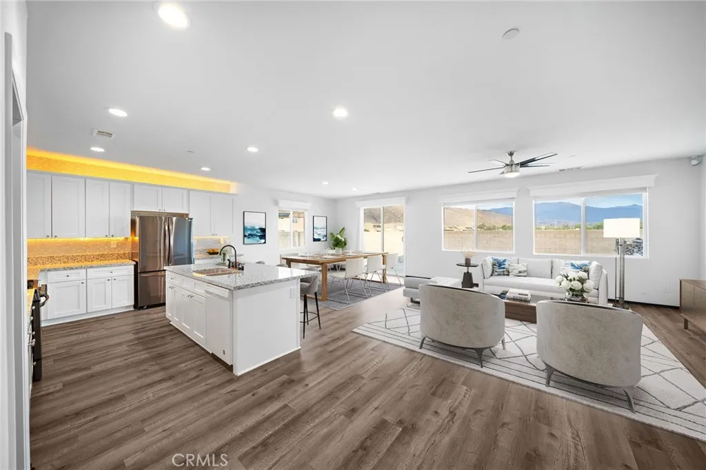 Virtual staging. Hallway viewing the kitchen and family rooms