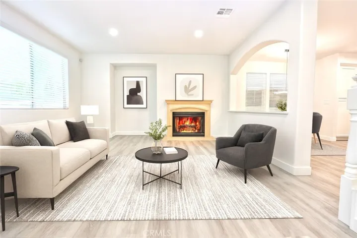Living Room With Gas Fireplace (Virtually Staged)