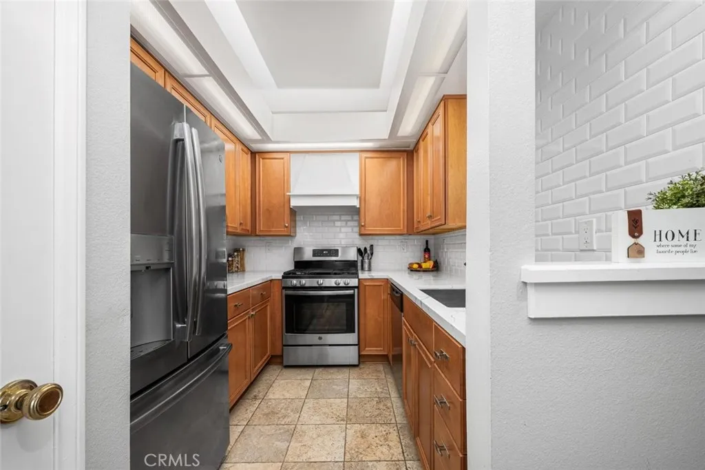 Remodeled kitchen with bright lighting yet soft on the eyes.