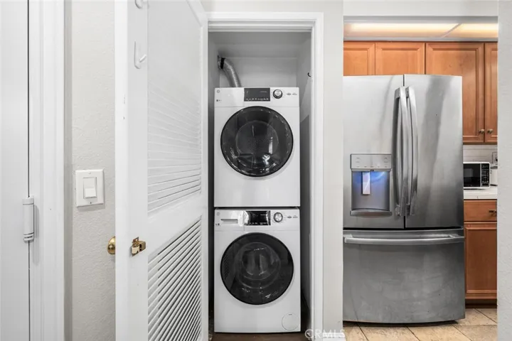 Conveniently located, stackable laundry included.