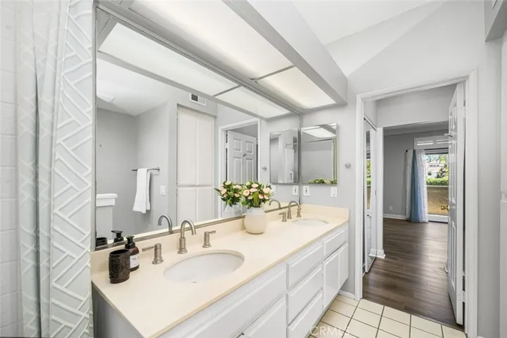 Elongated bathroom allows for double sink vanity.